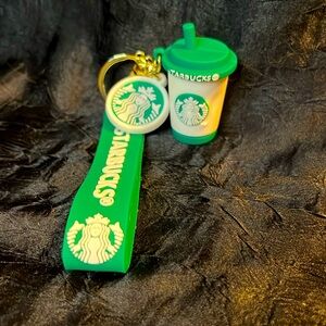 Starbucks white/green coffee cup keychain. With green wristlet strap. ￼